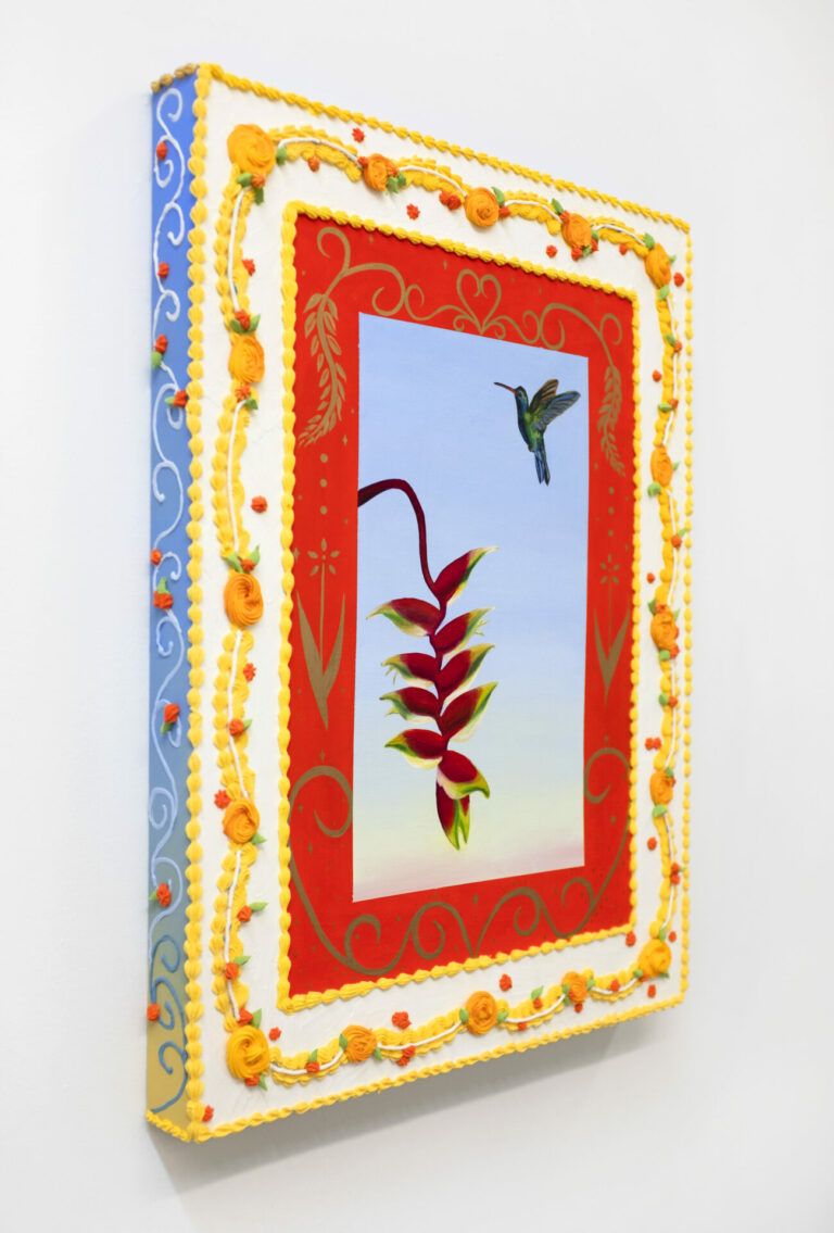 Hummingbird and Heliconia Rostrata plant with ornamental border.