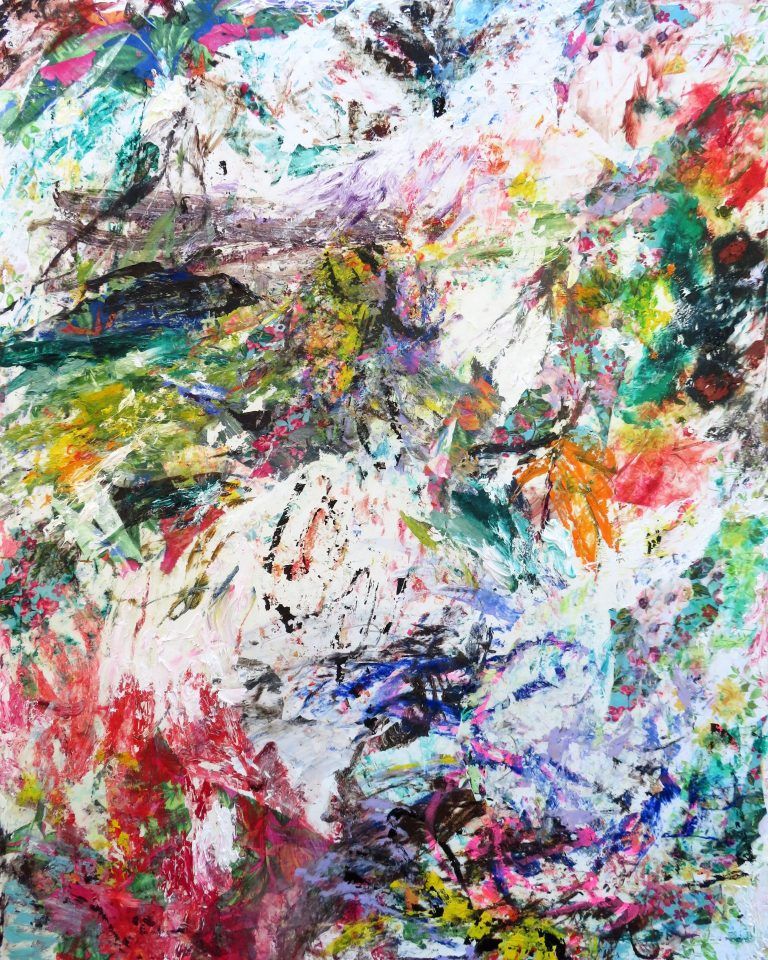 Sharp abstract shapes in white and rainbow colored paint.