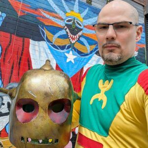Anthony Tirado at the National Puerto Rican Museum in Chicago dressed as El Coqui.