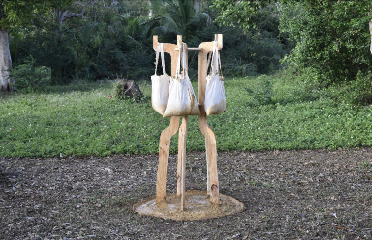 "The filtering apparatus resembles the outline of my body holding a bag. The 5 outlines become a structure that holds and filters wild clay from the impurities. The filtered and hard clay is later used to cover the structure of the apparatus and transform it into a chimney." - Valeria Nicolás Tizol Vivas.