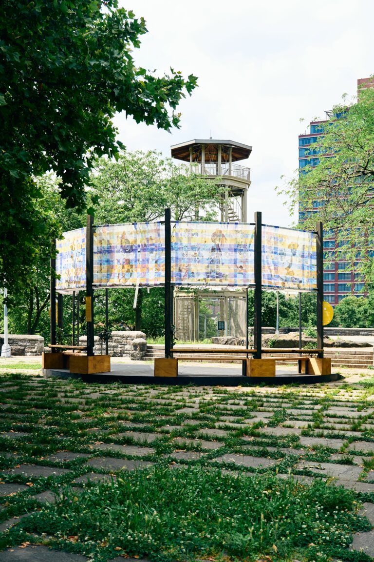 "The 32 foot circular structures incorporate a gathering space below striking fabric mesh canopies and a rotating “gallery” of community produced artwork. All of the installations included a signage and wayfinding scope of work." - Pedro Cruz Cruz