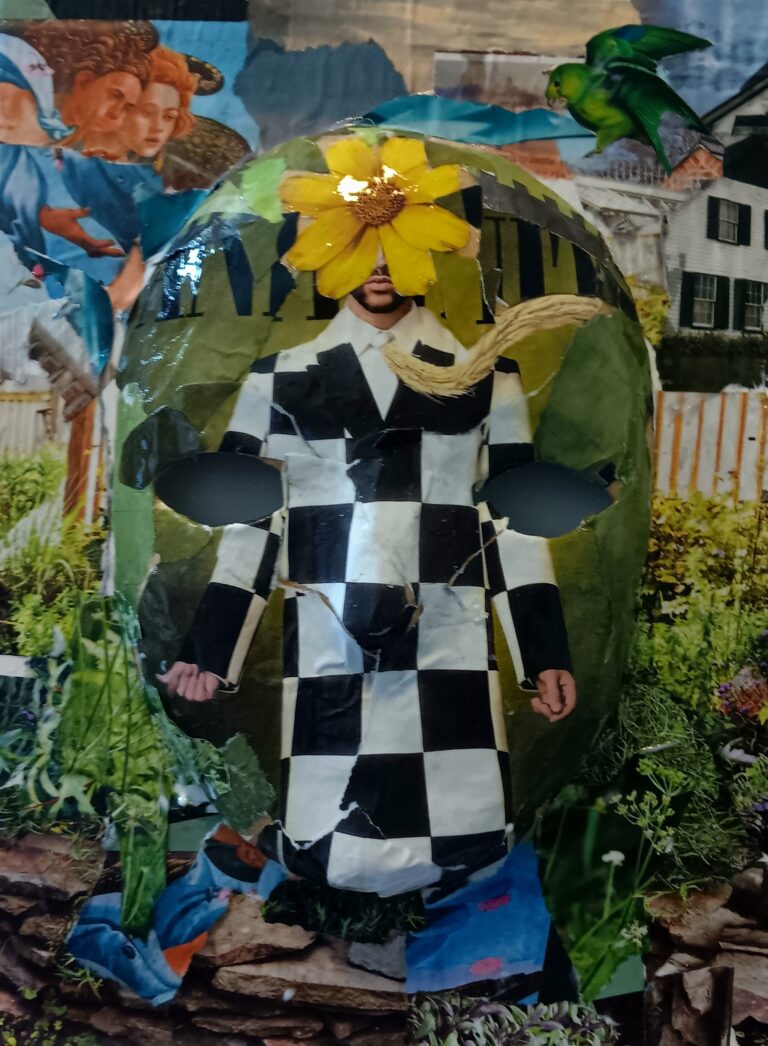 A full-face mask with a collage on the surface. The base is a distorted version of the Bad Bunny Vanity Fair October 2023 cover. His face is obscured by a yellow flower. The mask itself is mounted to a canvas that has images of greenery, angels, and a parrot.