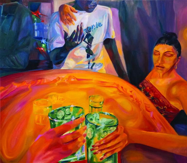 "An impression of a shared landscape engraved upon the table grounds the people at the table together." - Beatriz Whitehill. People clink green drinking glasses that contain the faces of people around them at a large orange table that swirls with texture.