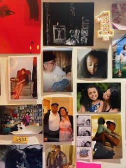 Pictures of the artist and her family hung on a wall.