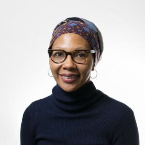 Image of Juanita Lanzo posing for a professional portrait.