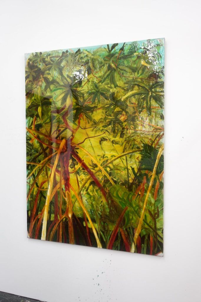 Mangroves painted in oranges and greens. Viewed from below.