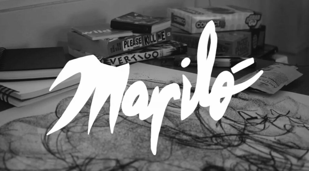 Title page still from Mariló (2024). Black and white image with the text  "Mariló" large in white.