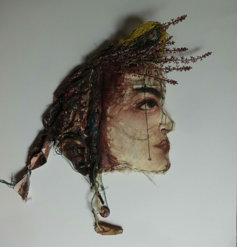 Mixed media piece of a woman with objects in her hair.