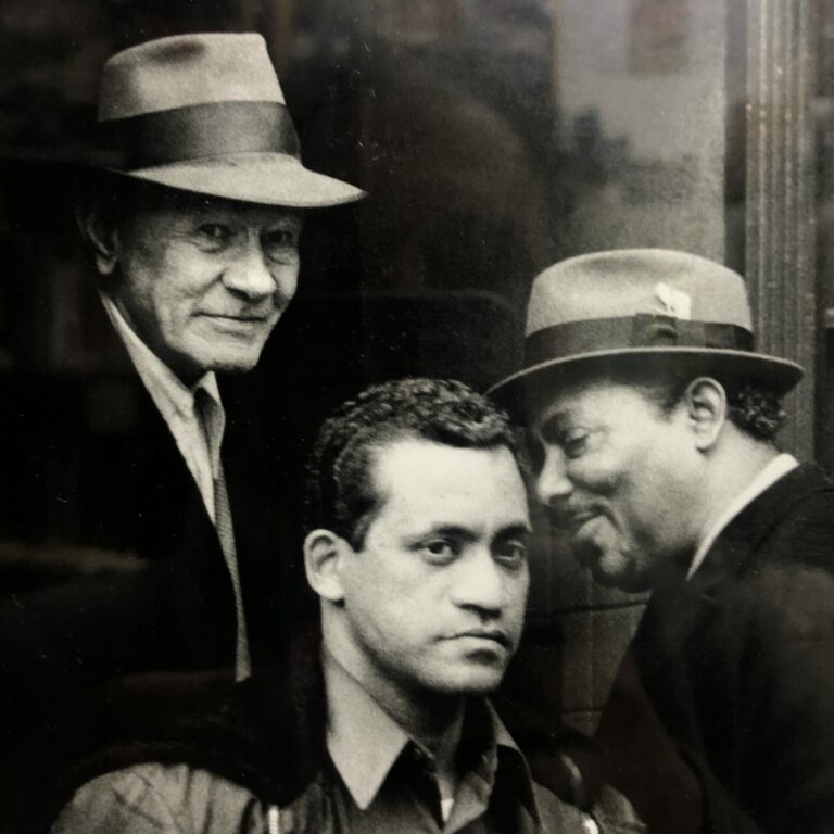 Black and white photo/silver gelatin print of three well-dressed men.